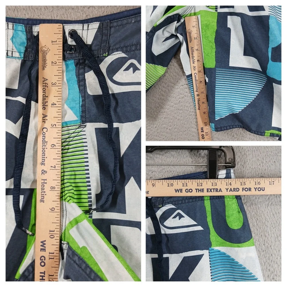 Quiksilver Board Shorts All Over Logo Spellout Swim Trunks Size 28 Blue Lime EUC